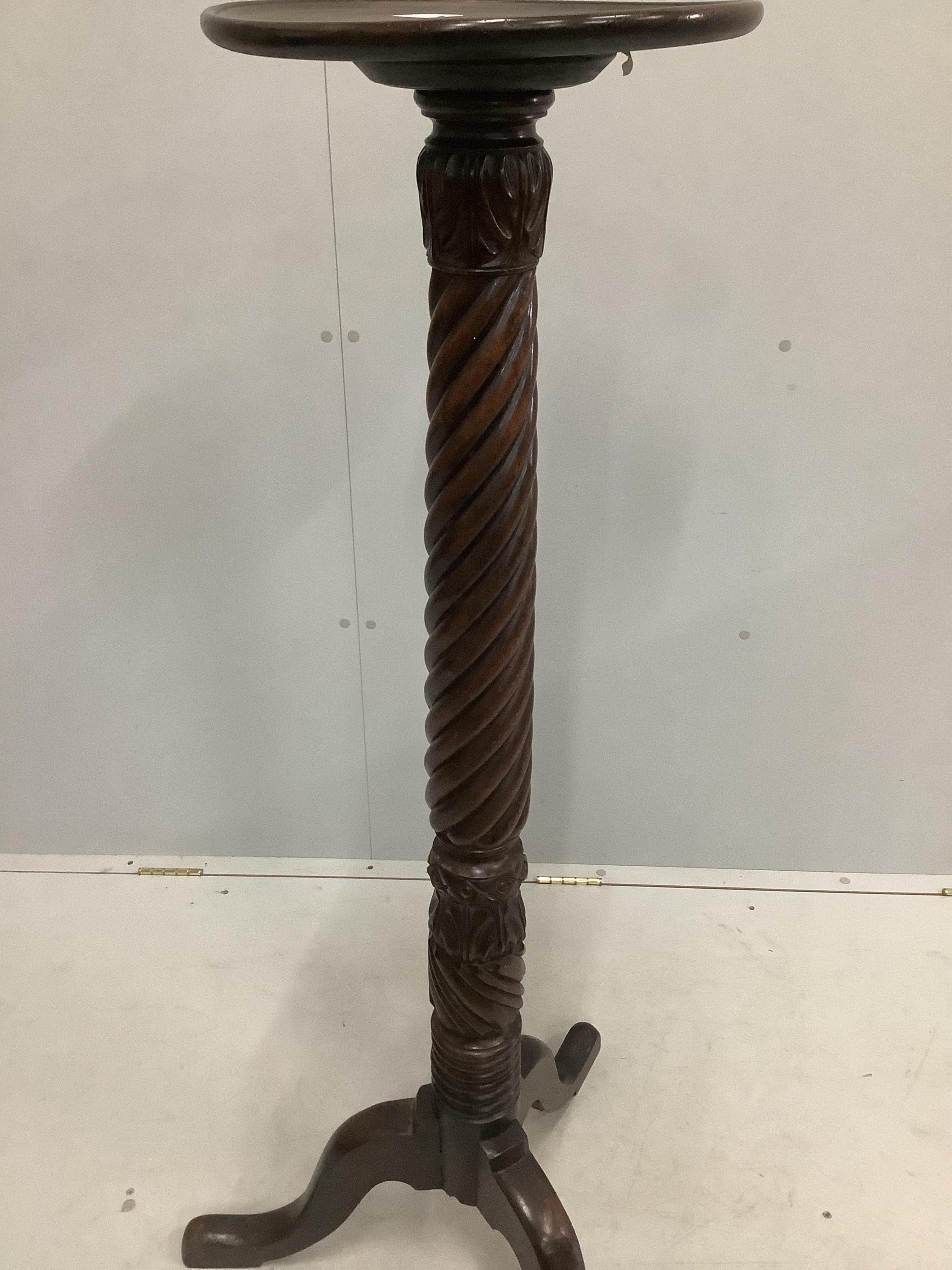 A Victorian and later spiral twist mahogany torchere, height 131cm. Condition - fair